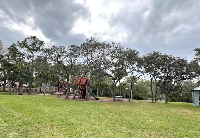 view of playground with a yard