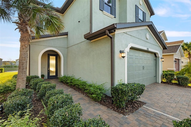 view of property exterior with a garage