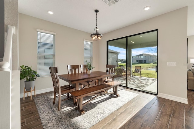 dining room featuring dark hardwood / wood-style floors