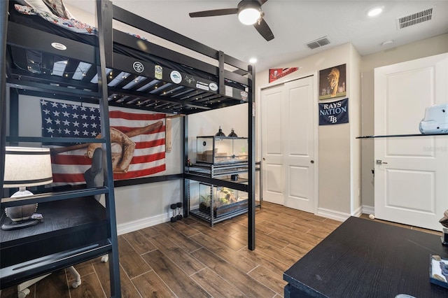 bedroom featuring hardwood / wood-style flooring