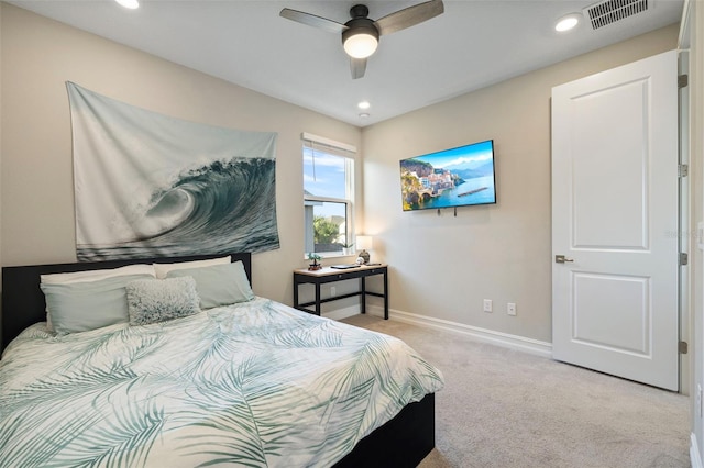 carpeted bedroom featuring ceiling fan