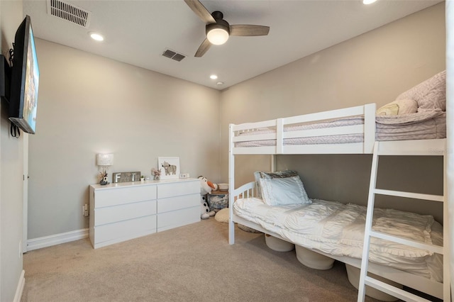 bedroom featuring ceiling fan and light colored carpet