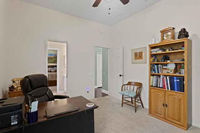 office with a ceiling fan and carpet floors