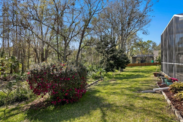 view of yard featuring fence