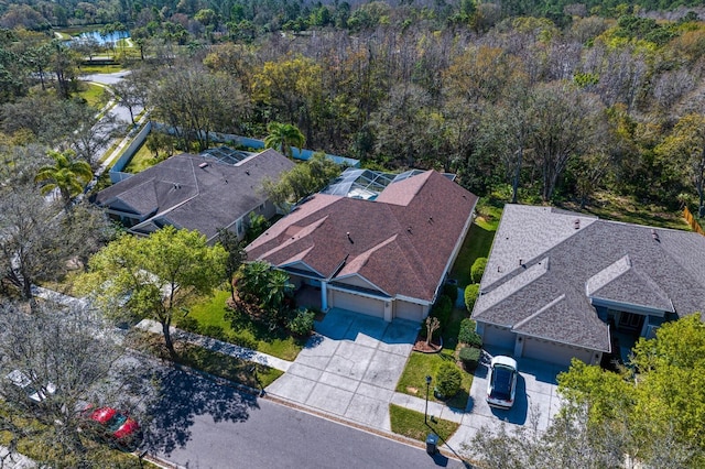 aerial view featuring a view of trees