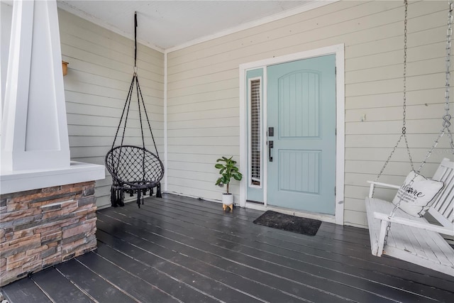 property entrance with covered porch