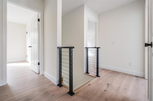 hallway featuring light hardwood / wood-style floors