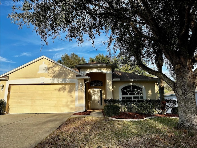 ranch-style home with a garage