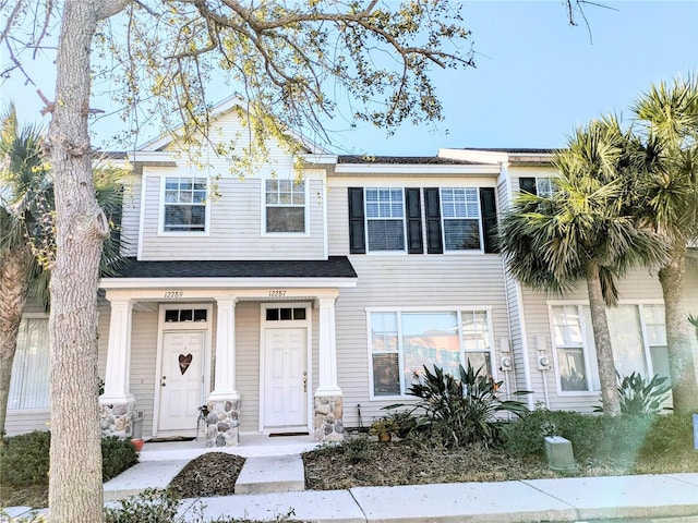 view of property featuring a porch