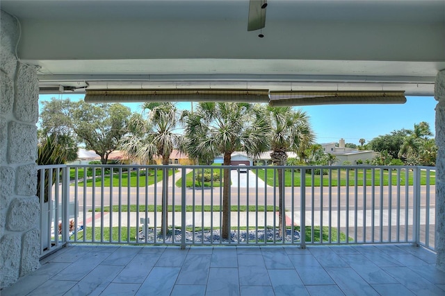 view of gate featuring a yard