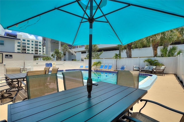 view of pool with an outdoor hangout area and a patio area