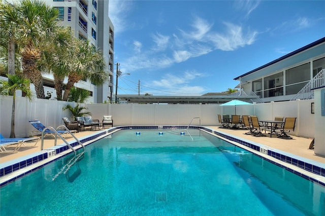 view of pool featuring a patio area