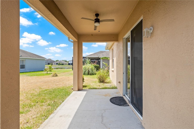 view of patio / terrace featuring ceiling fan