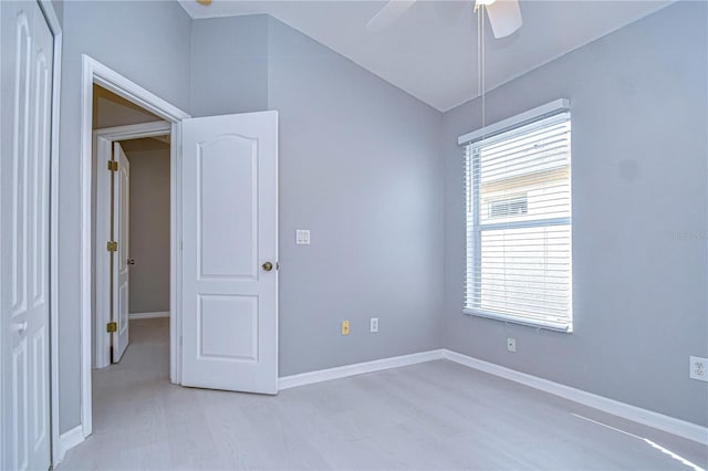 unfurnished room featuring ceiling fan and light hardwood / wood-style flooring