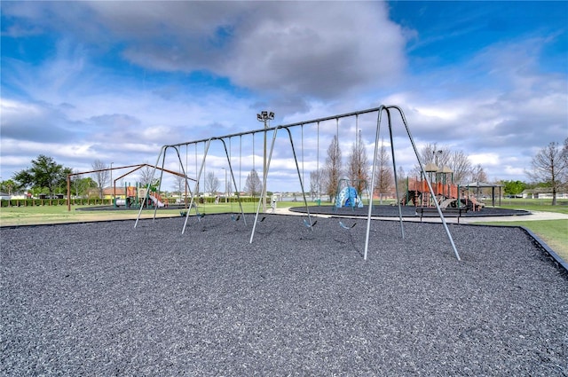 view of jungle gym with a lawn