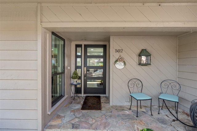 entrance to property with a patio area