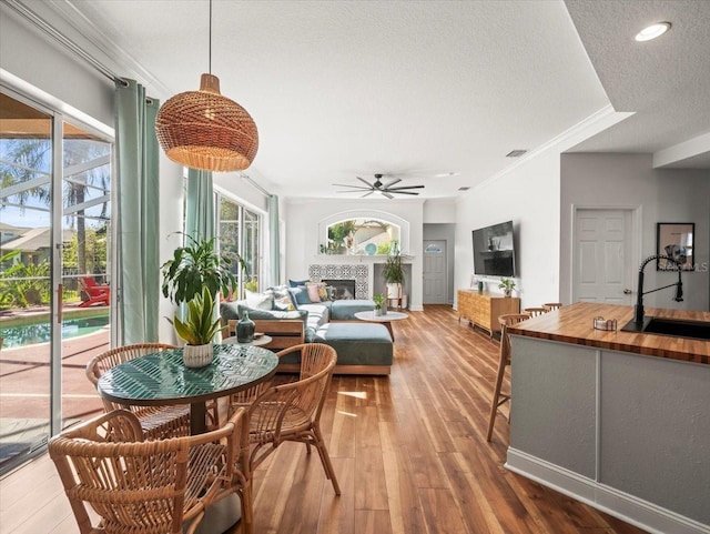 interior space with ceiling fan and sink