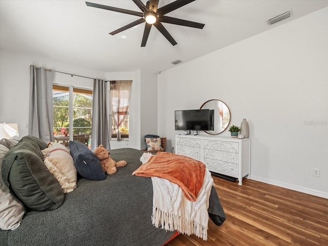 bedroom featuring hardwood / wood-style floors and ceiling fan