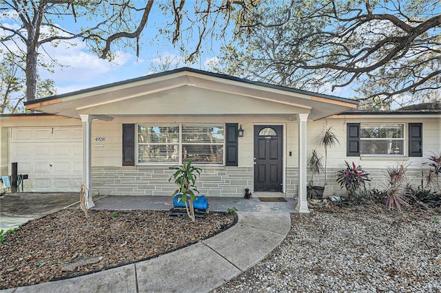 single story home with a garage