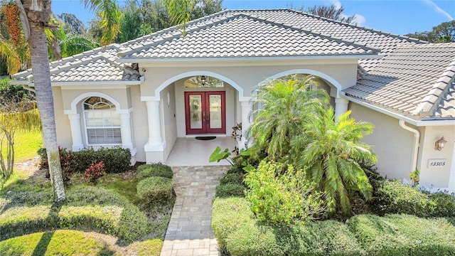 doorway to property with french doors