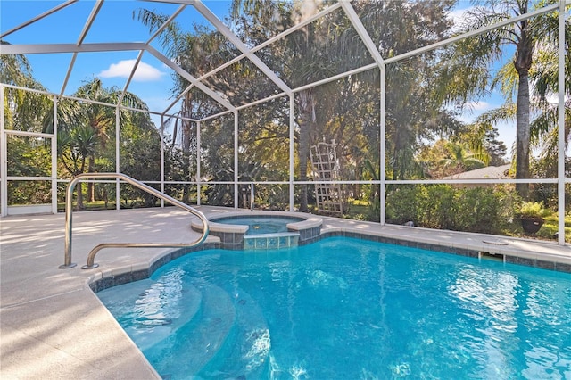 view of swimming pool with a lanai, a patio, and an in ground hot tub