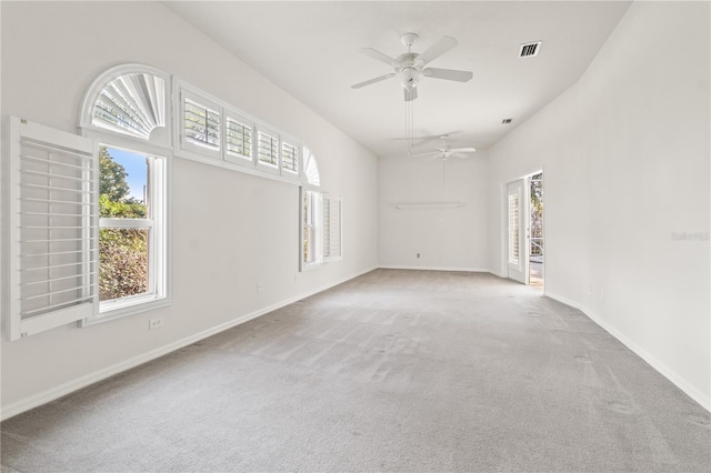 carpeted empty room with ceiling fan