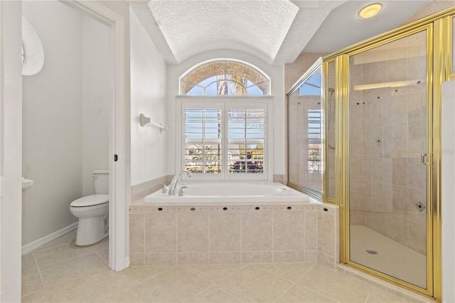 bathroom featuring independent shower and bath, plenty of natural light, tile patterned floors, and toilet