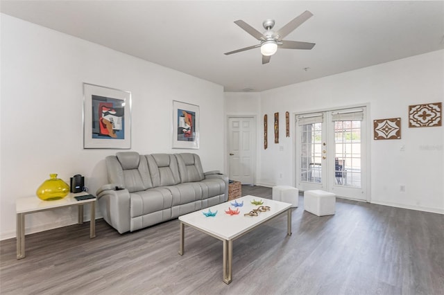 living room with hardwood / wood-style floors, french doors, and ceiling fan