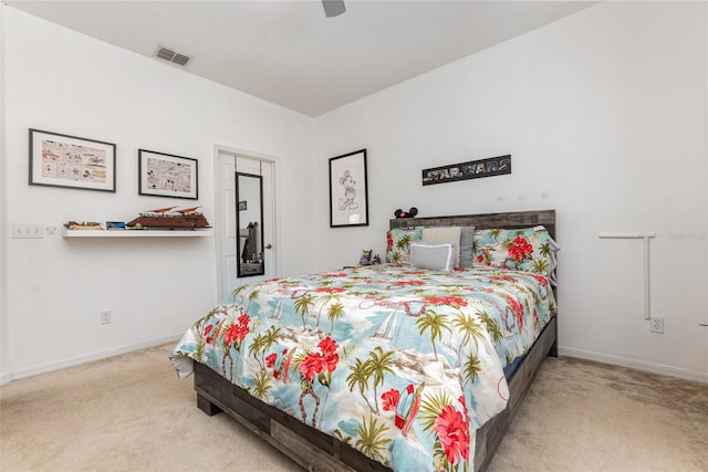 carpeted bedroom with ceiling fan