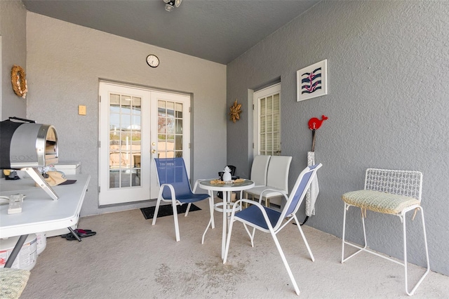 view of patio featuring french doors