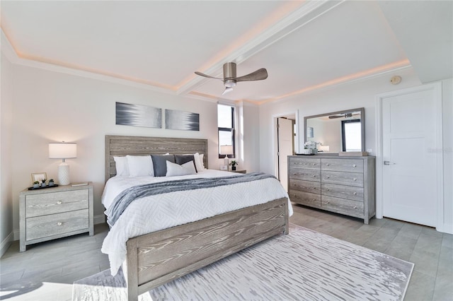 bedroom with crown molding, ceiling fan, and hardwood / wood-style flooring