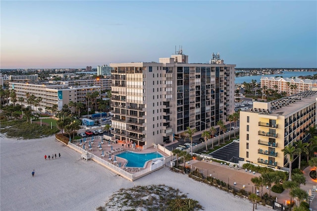 outdoor building at dusk featuring a water view