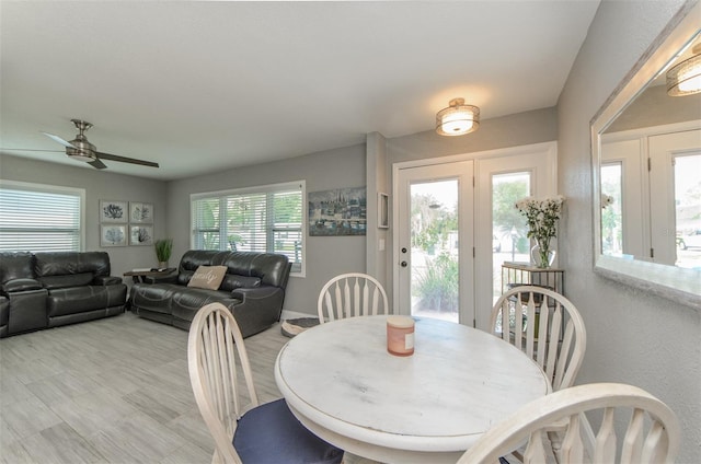 dining space featuring a ceiling fan