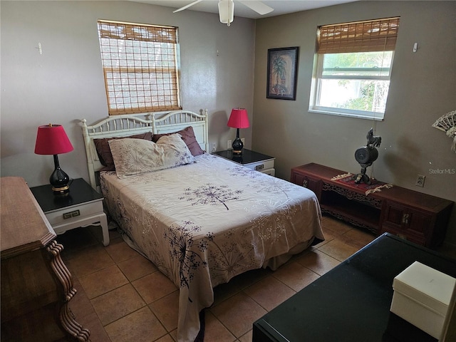 bedroom featuring light tile patterned flooring