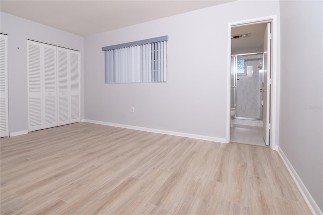 unfurnished bedroom with light hardwood / wood-style flooring