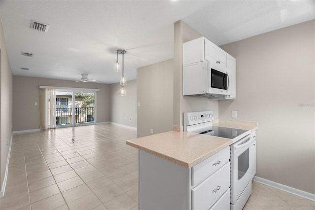 kitchen with light tile patterned floors, white appliances, ceiling fan, white cabinetry, and decorative light fixtures