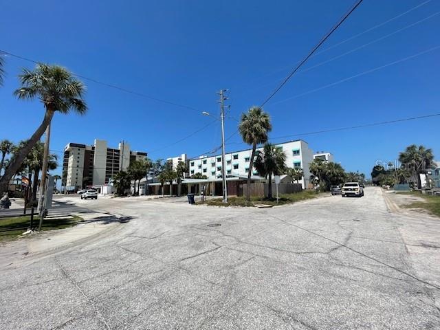 50 154th Ave Unit 50, Madeira Beach, FL 33708 - view of asphalt street with street lighting