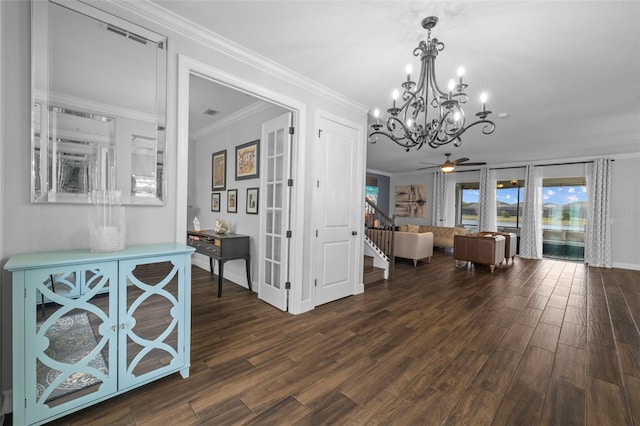 dining area with crown molding, ceiling fan, and dark wood-type flooring