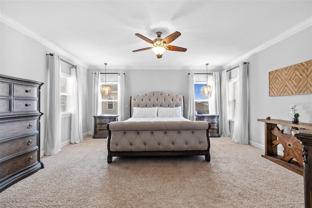 bedroom with ornamental molding, light colored carpet, and ceiling fan