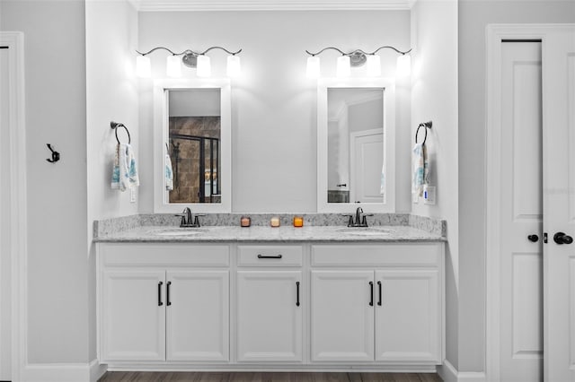 bathroom with vanity and walk in shower