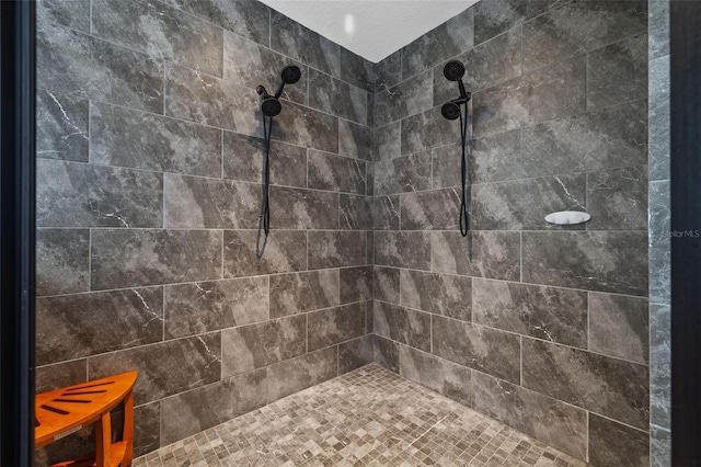 bathroom featuring tiled shower