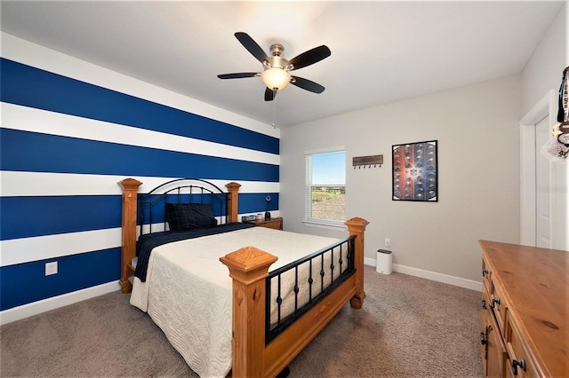 bedroom featuring dark colored carpet and ceiling fan