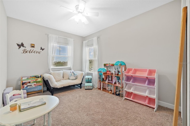 rec room featuring ceiling fan and carpet flooring