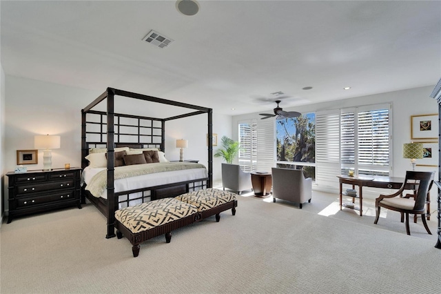 bedroom featuring light colored carpet