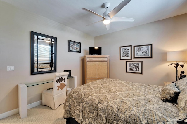 bedroom featuring light carpet and ceiling fan