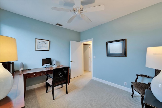 office with ceiling fan and light carpet