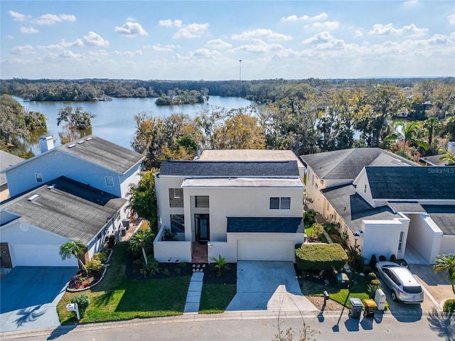 drone / aerial view with a water view