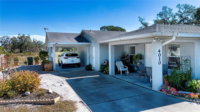 exterior space featuring a carport