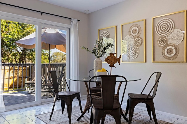 dining room with baseboards