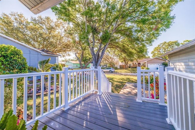 deck featuring a residential view and an outbuilding